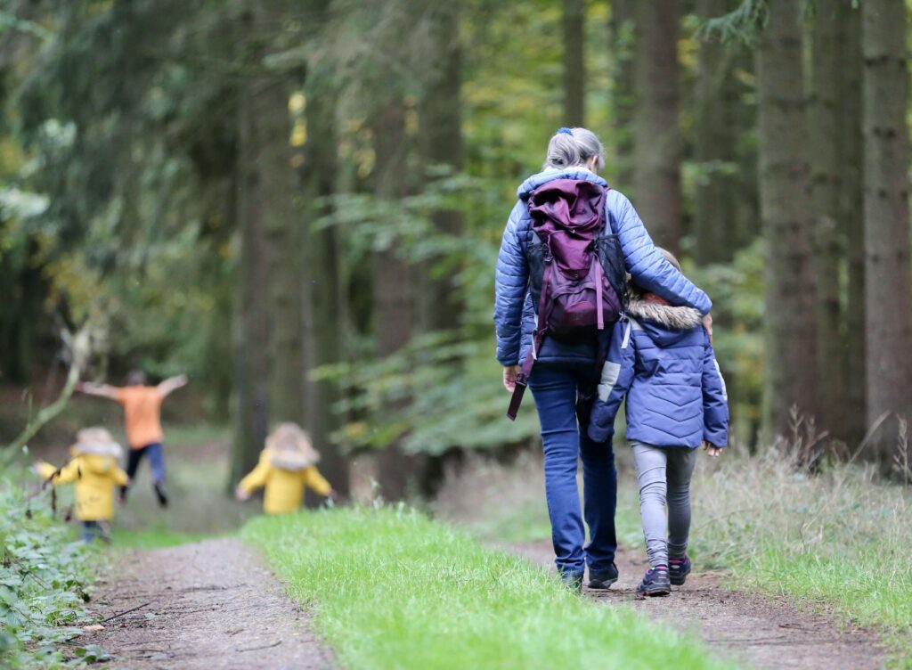 The Top 10 Stress-Relieving Hobbies 5 A woman went for a walk in nature with her children to relieve stress